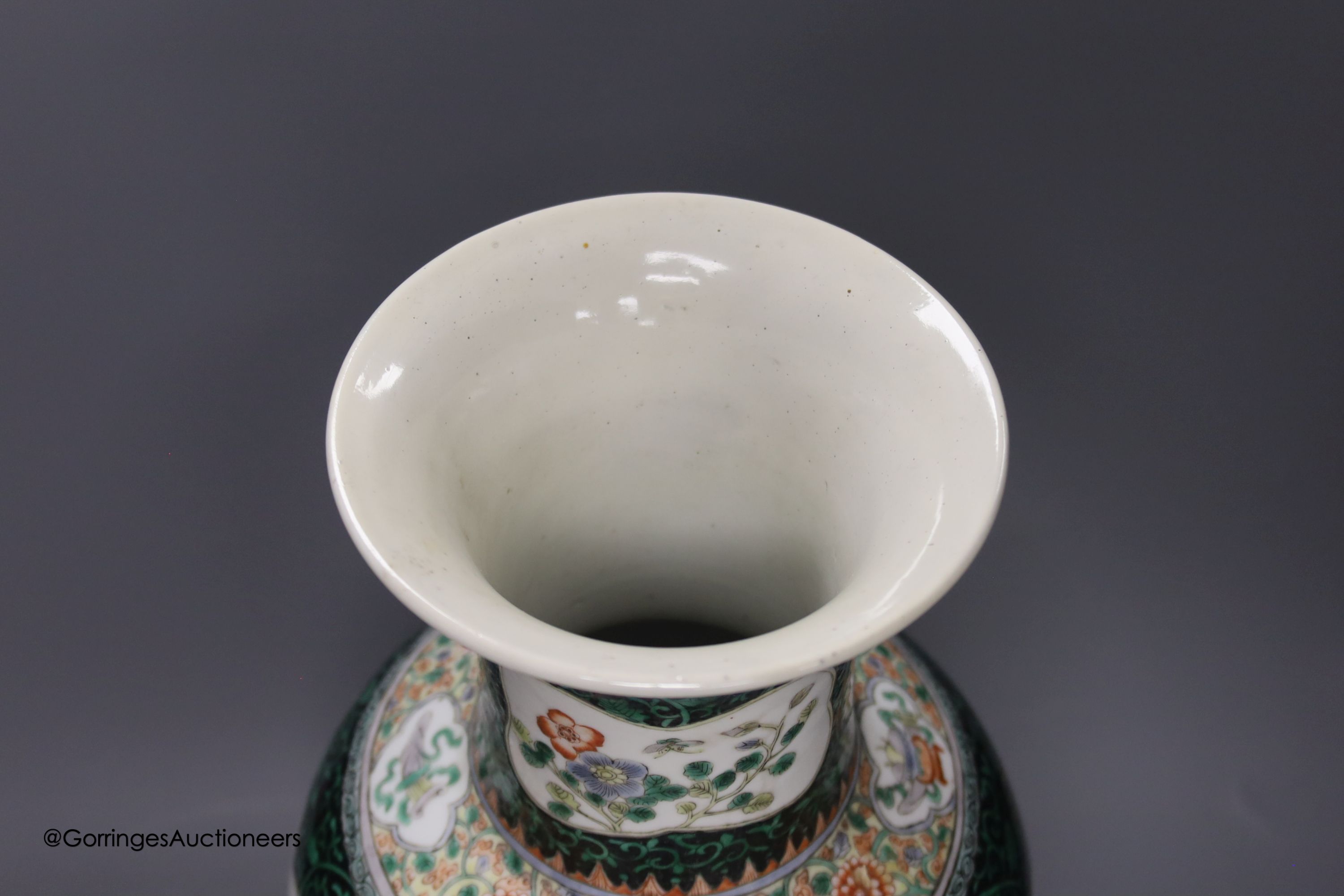A large 19th century Chinese famille noire vase, height 46cm, restored neck